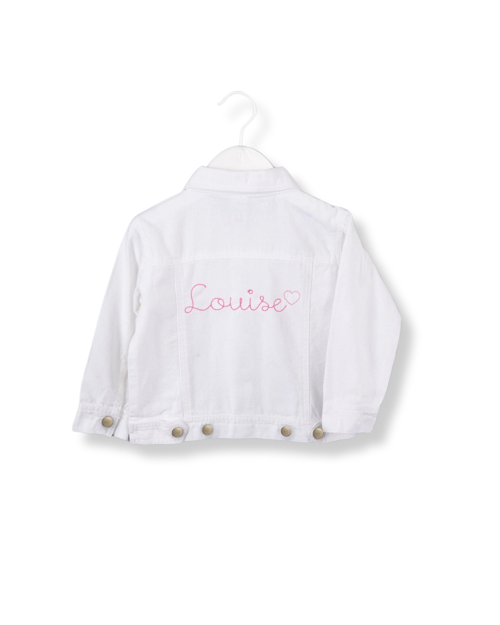 A blue denim jacket for big kids displayed on a hanger, featuring brass colored snap buttons and a front pocket.