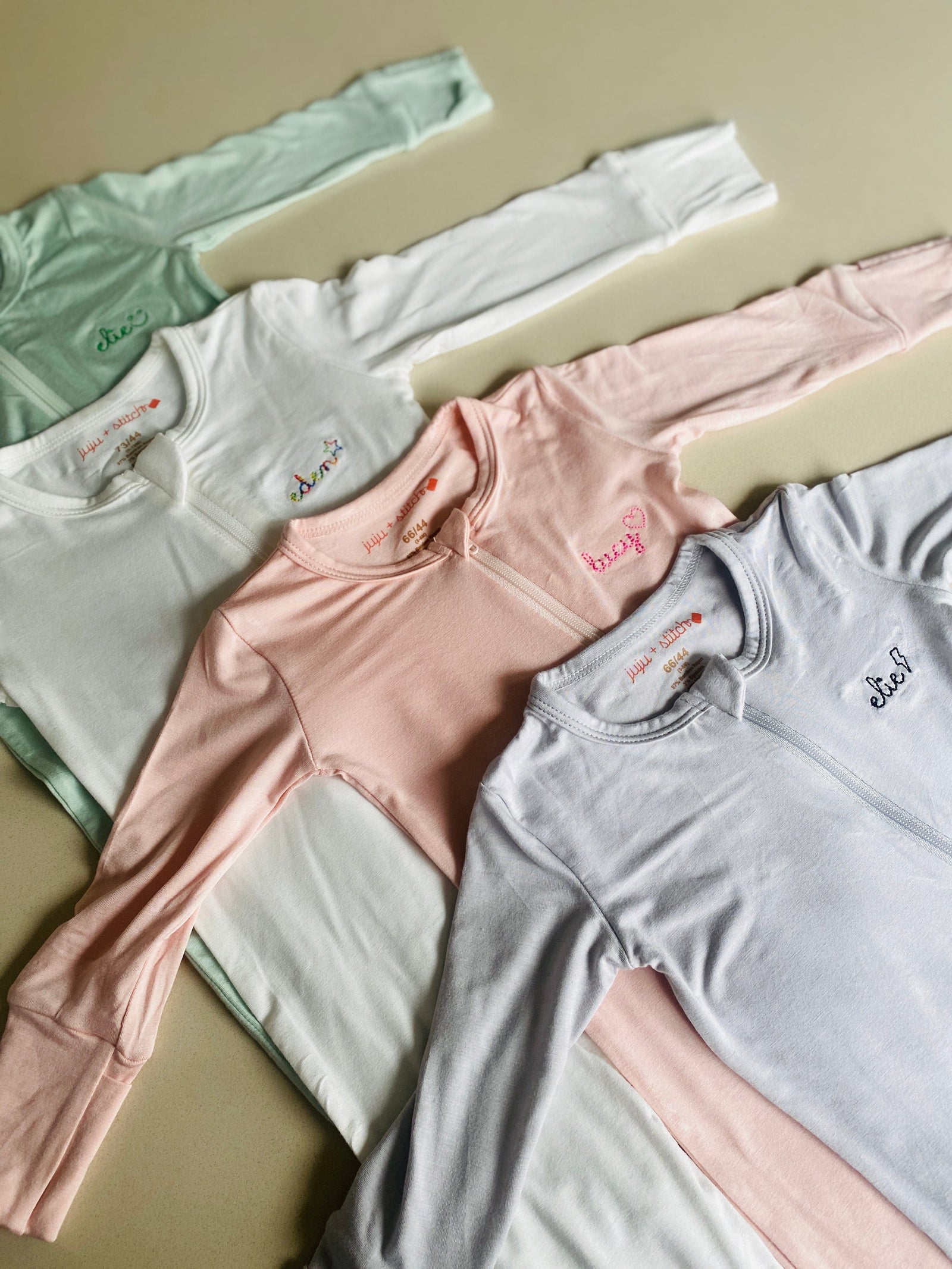 Baby long-sleeve bamboo footie in mint with custom name embroidery