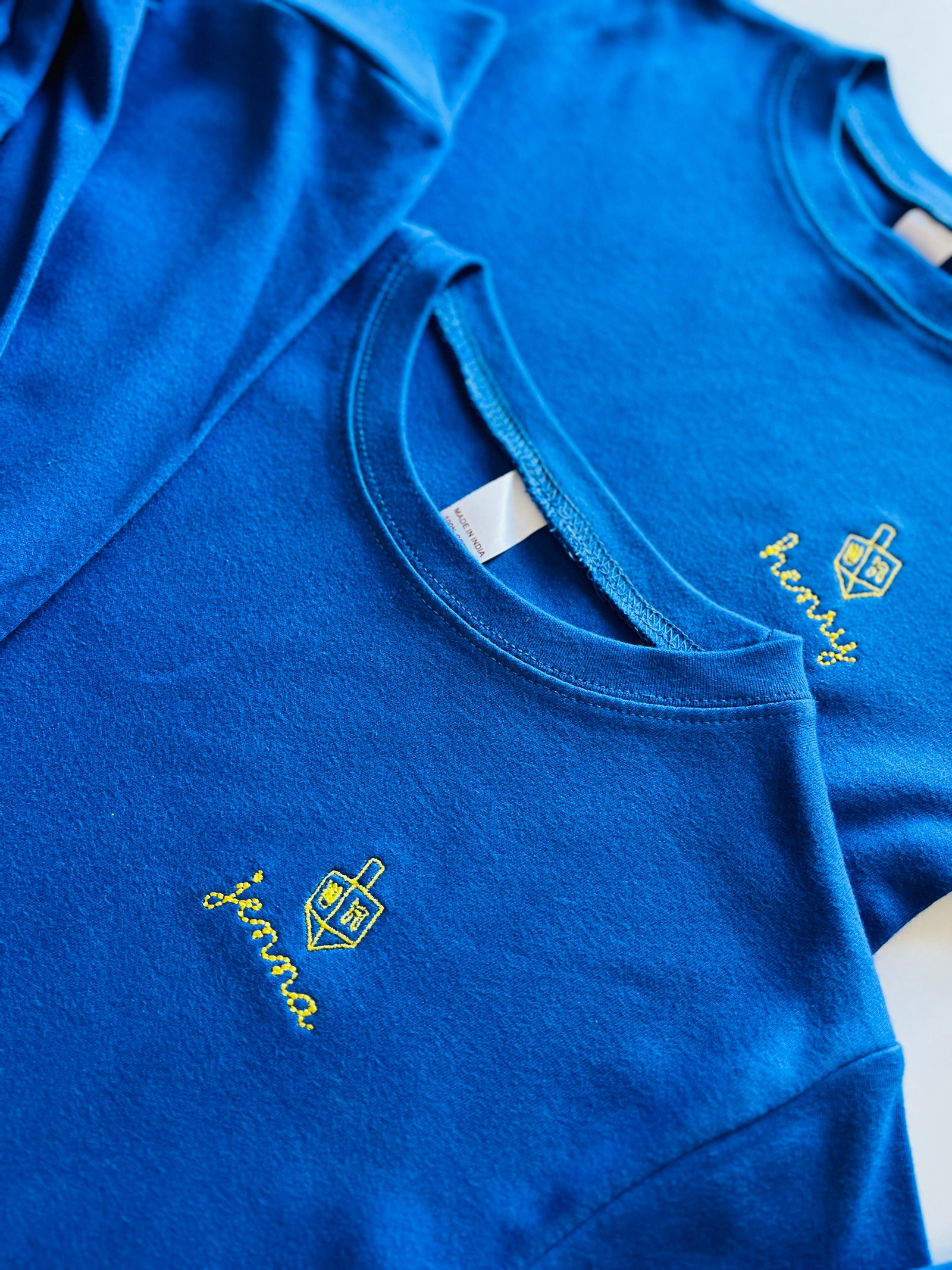 Personalized Hanukkah pajamas with dreidel design