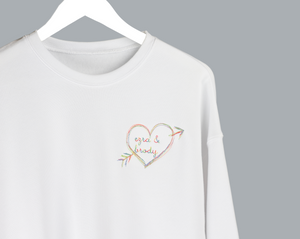 Personalized sweatshirt with heart and arrow embroidery