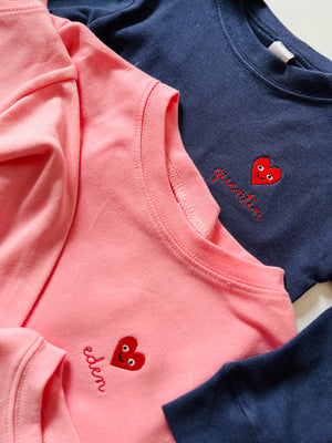 Personalized pajama set with embroidered heart icon