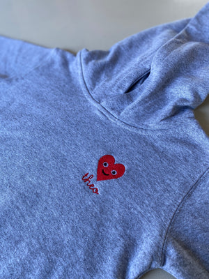 Valentine’s Day kids hoodie – personalized red smiley heart design