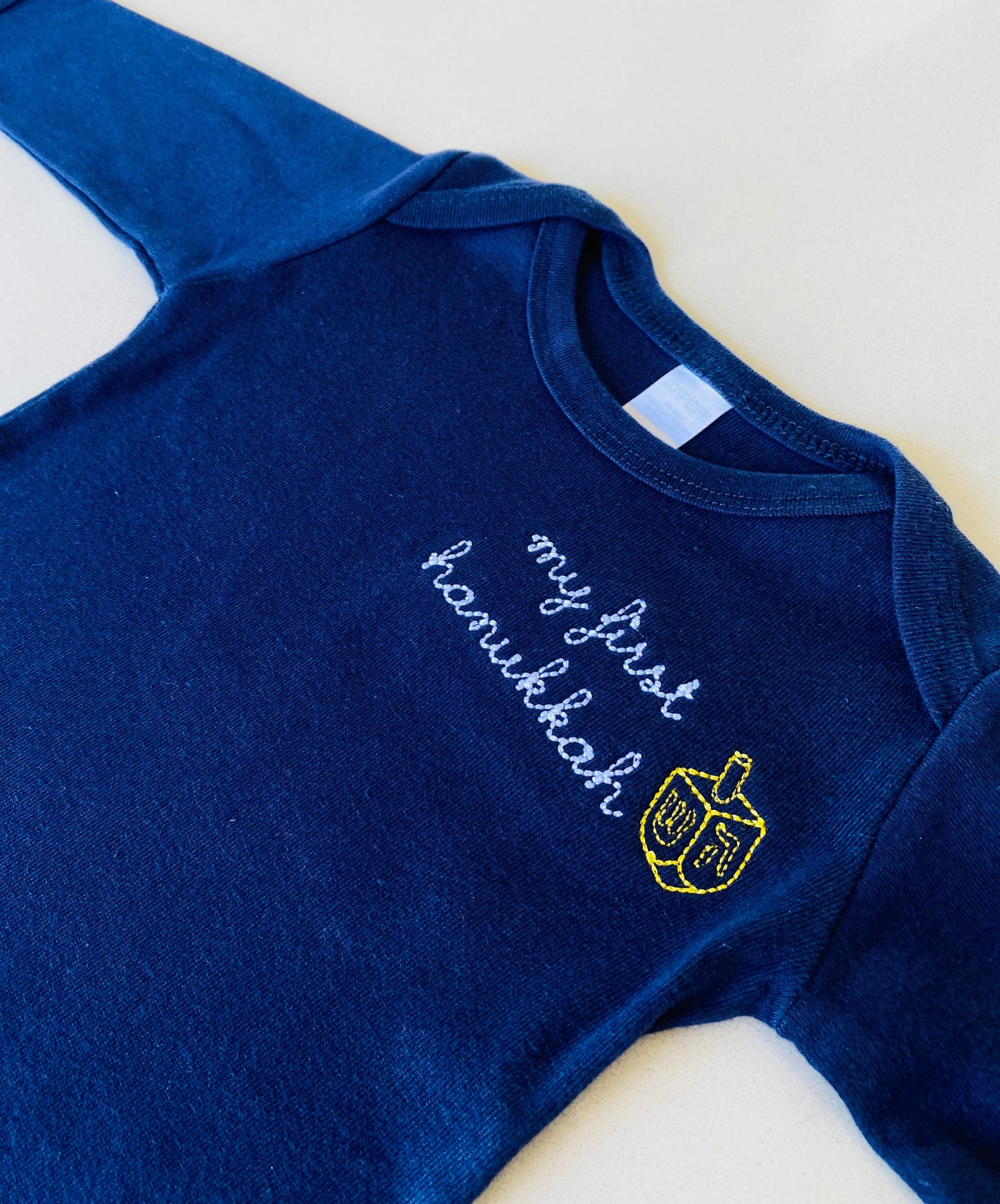 My first Hanukkah baby onesie – pre-embroidered