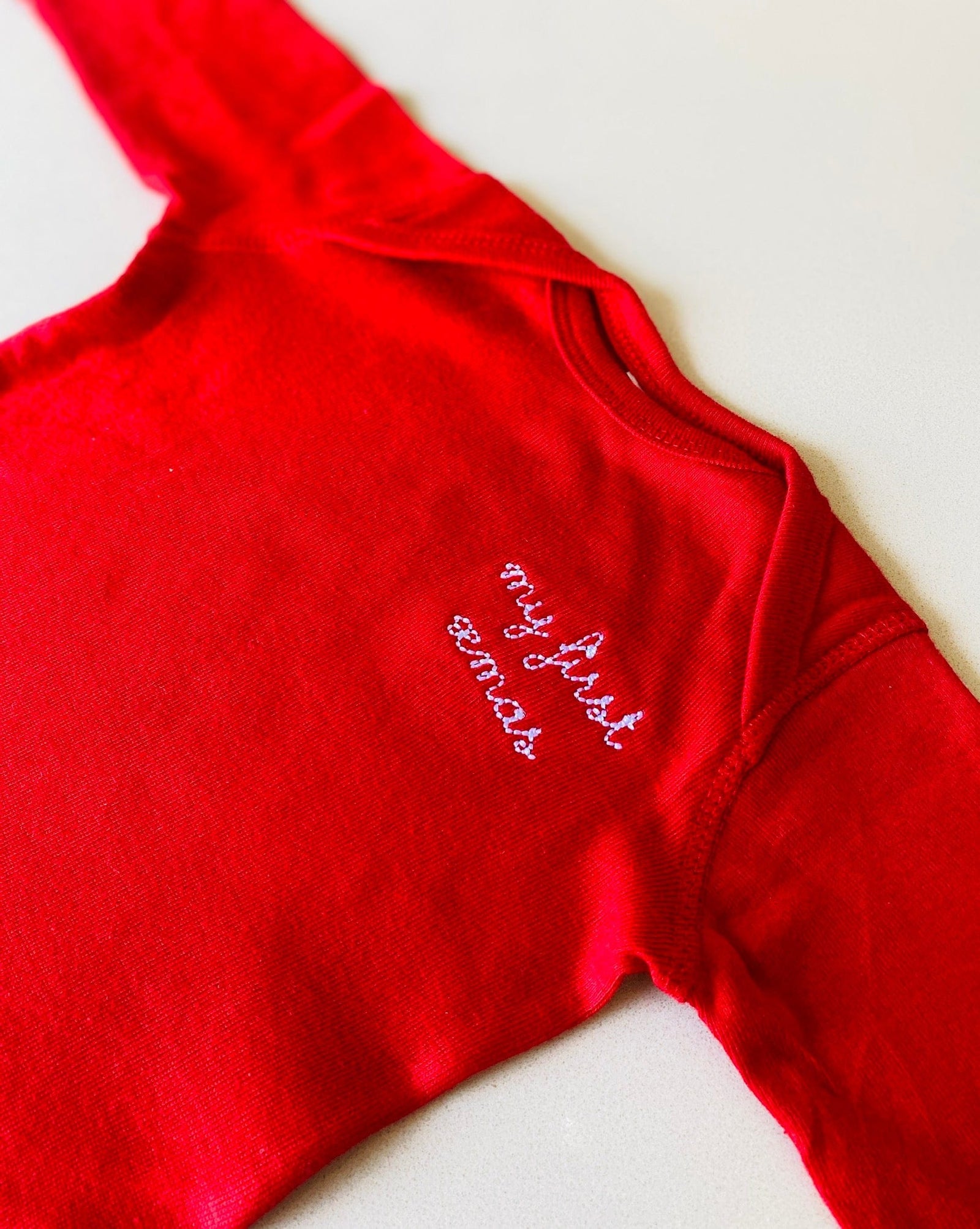 My first Xmas baby onesie – pre-embroidered