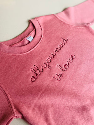 All you need is love kids crewneck sweatshirt – pre-embroidered